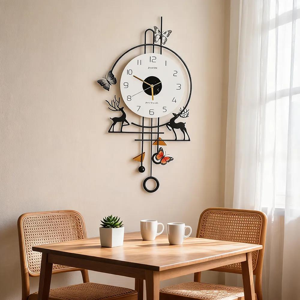 Modern minimalist iron art wall clock with elk and butterfly motifs; a light-luxury, silent, creative, and playful wall timepiece—perfect as a wall decoration for the living room or dining room.