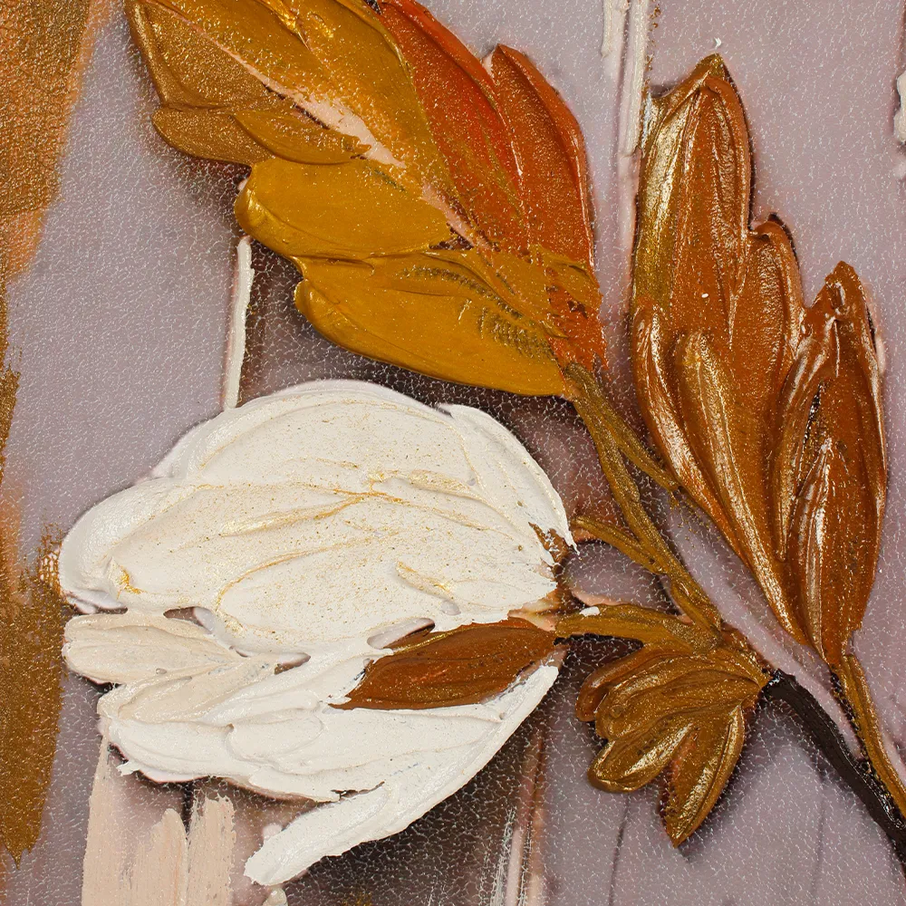 Detail shot of gilded textured leaves on floral artwork